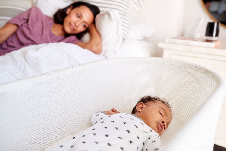 Baby Sleeping Near Mom During Holiday Travel