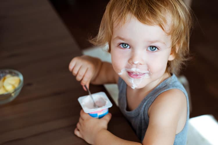 Child Eating Yogurt