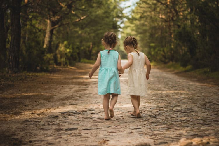 Girls Walking On Hiking Trail