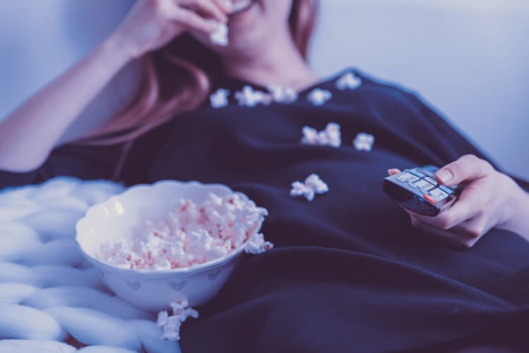 Mom Eating Popcorn And Laughing