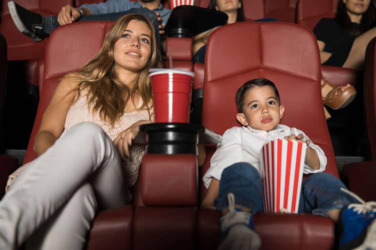 Mom And Son At Movie Theater