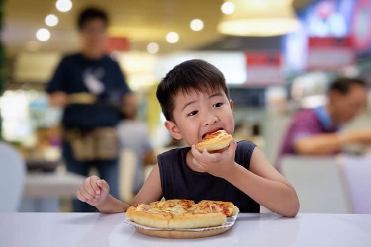 Child Eating Pizza In Napa Valley