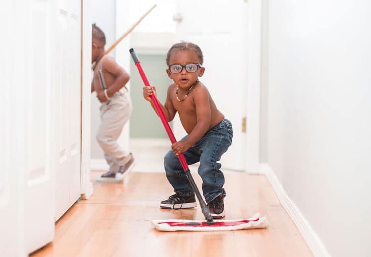 child cleaning up for holiday preparation