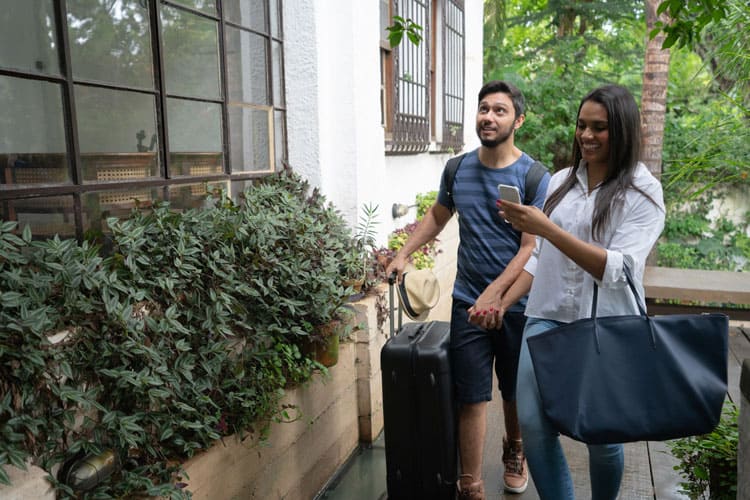 Couple Entering Their Airbnb