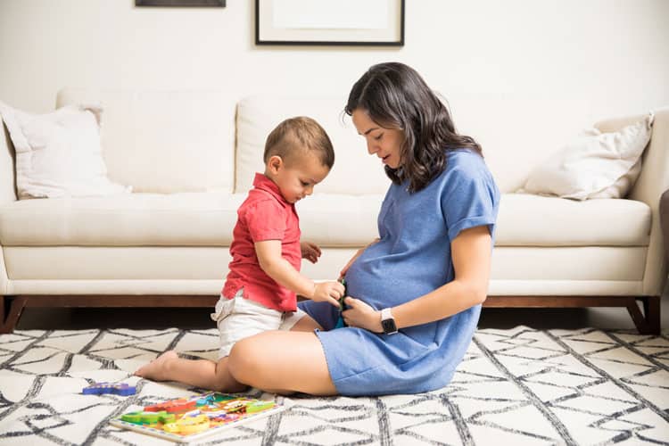 Pregnant Woman With Child