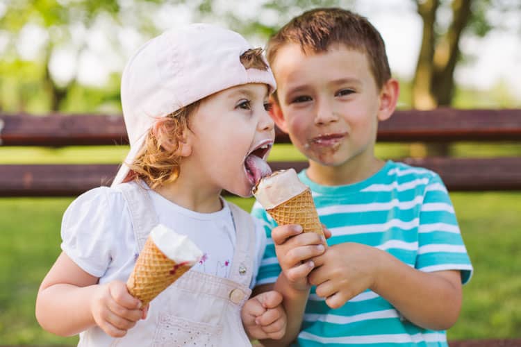 Two Children Eating Ice Cream