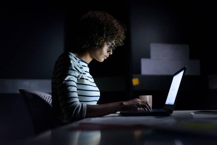 Woman Working A Side Hustle At Night