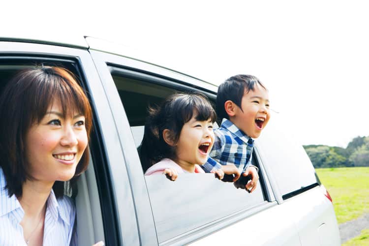 Happy Asian Family Traveling