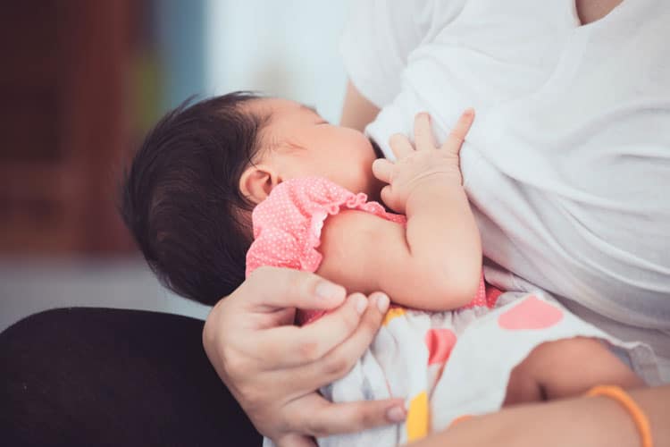 Mother Nursing Her Baby