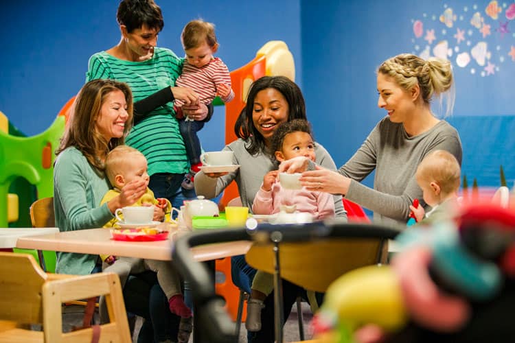 Woman And Children At A Party