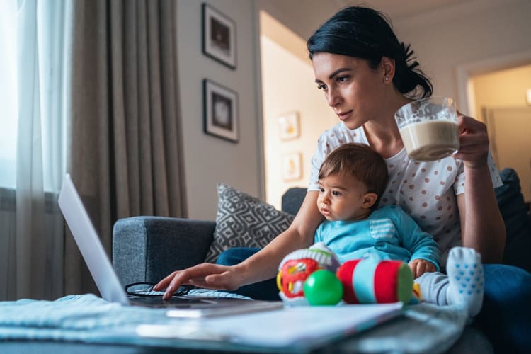 Mother Reading Blogs With Her Son