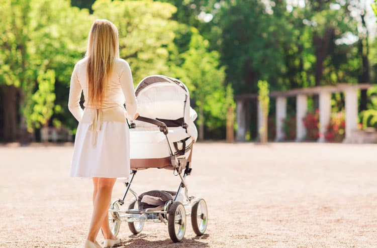 Woman Pushing Stroller