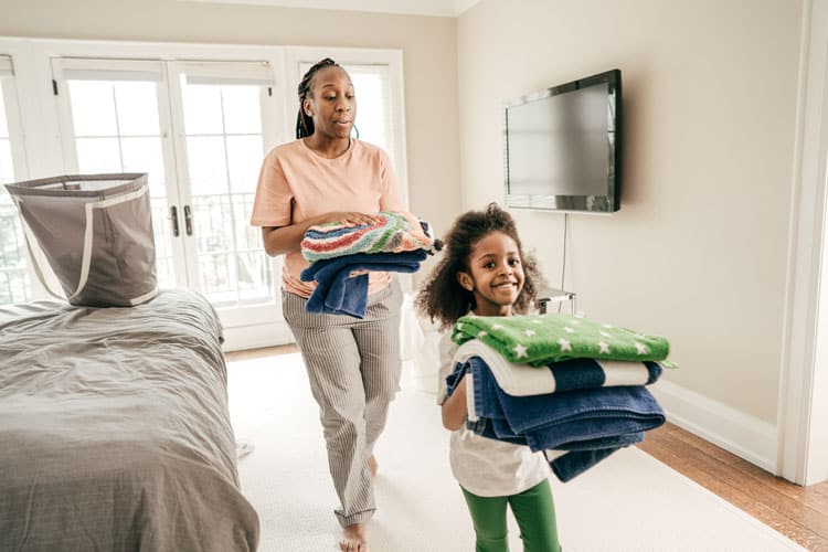 Mother Teaching Child With Positive Parenting Solutions