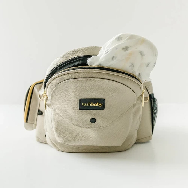 Tushbaby The Original Premium Quality Hip Seat Carrier – Safety-Certified Baby & Toddler Carrier with Secure Safety Buckles, No-Flimsy-Foam Design, Storage Pockets & Nursing Pillow. 0–3 yrs